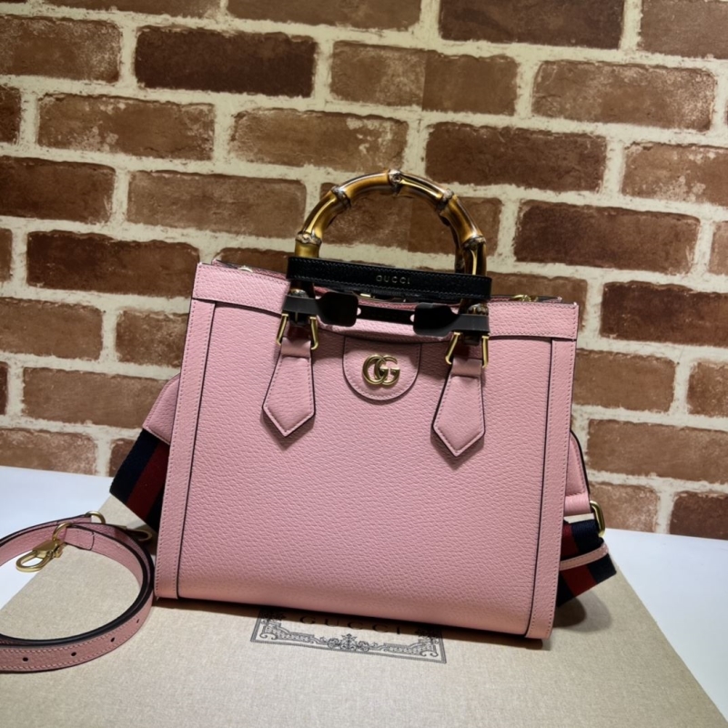G*u*i top handle bags